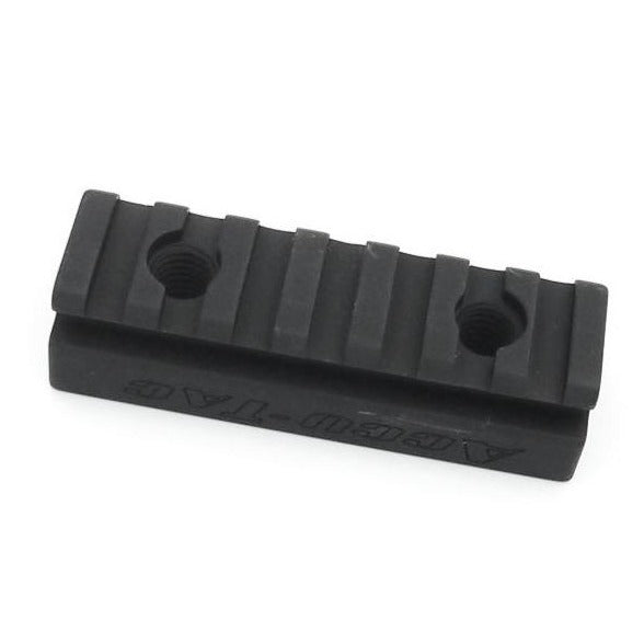 Accu-Tac Barrett Spec Rail seen along its length at an angle, showing the slotted top face