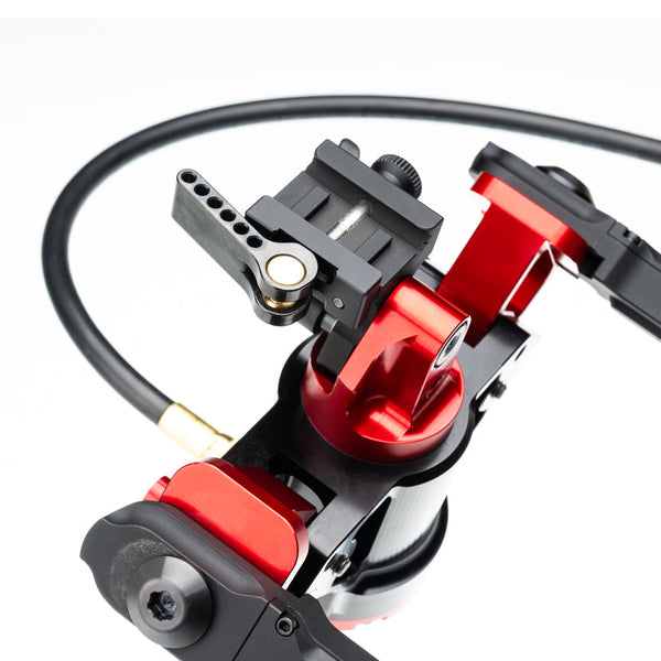Accu-Tac HYB-500 Hydro Bipod in black with red hydraulic cylinder and Picatinny mount