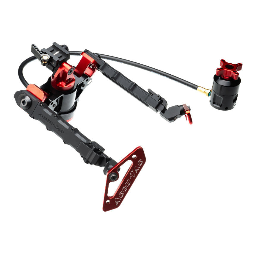 Accu-Tac HYBA-500 Hydro Bipod in black and red shown in use at an angle beneath a precision rifle