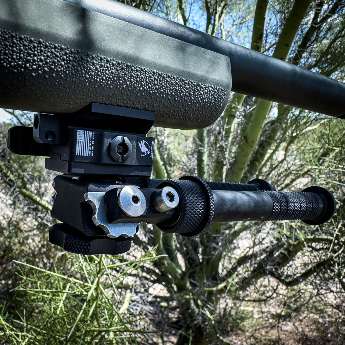 American Defense ADM-170-S bipod base with a lever clamp and black anodised finish